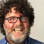 Journalist Russell Woolf dies